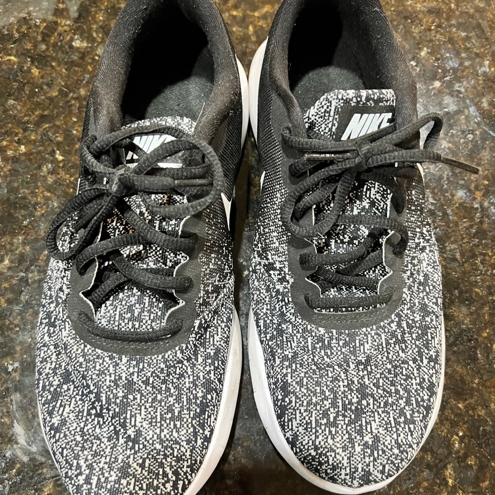 Nike tennis shoes. Men’s Size 8. Black and White fabric.  White soles.